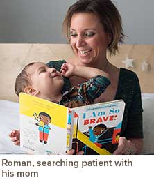 Roman, searching patient, with his mom