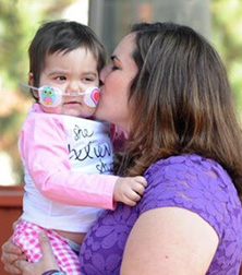 Skye, blood stem cell transplant recipient, with her mom